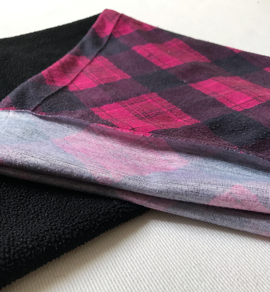 pink and black checkered gaiter folded #keepingwarm #colderweatherruns #womenrunninggear