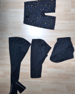 black running shorts and leggings