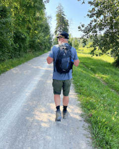 man hiking with backpack on